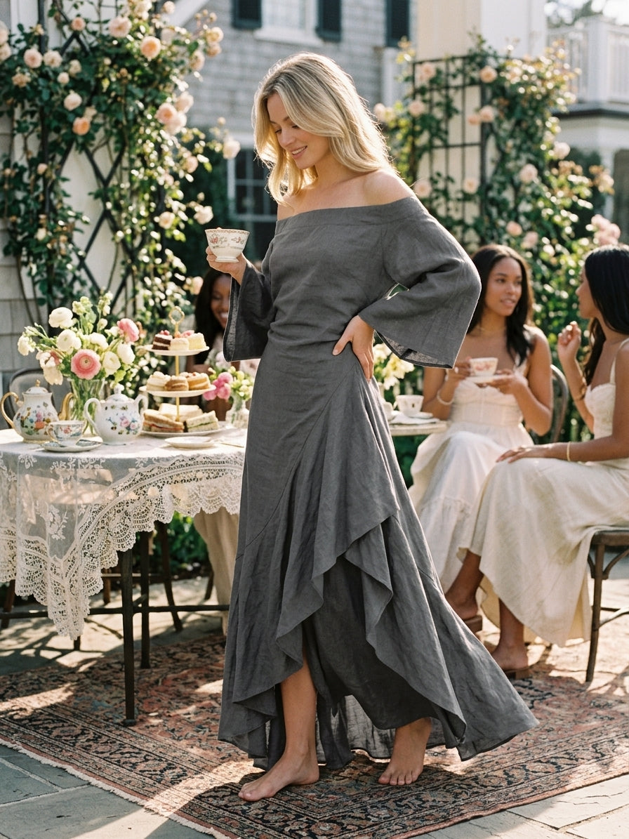 Aure | Robe maxi minimaliste à épaules dénudées, ourlet volanté et manches évasées