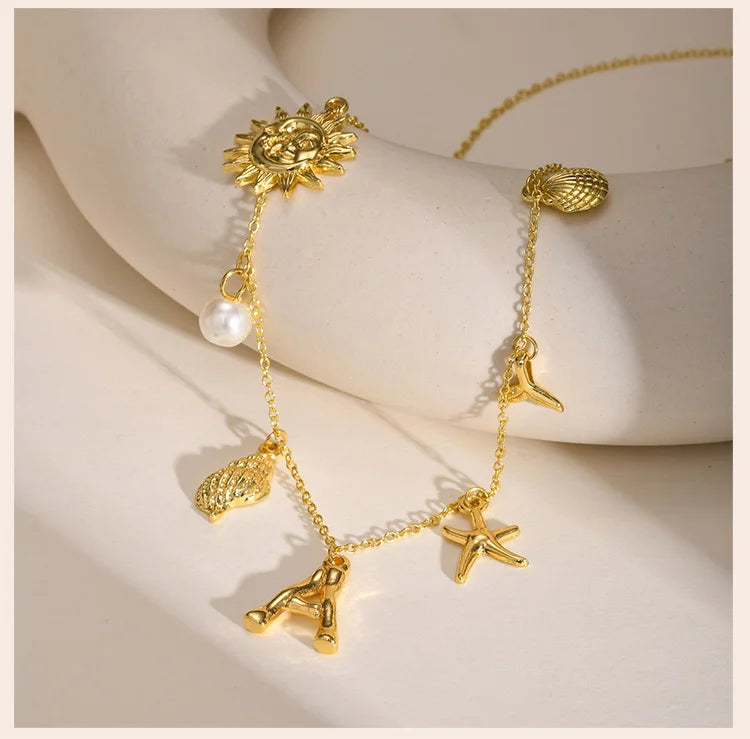Eugénie | Collier initiale coquillage